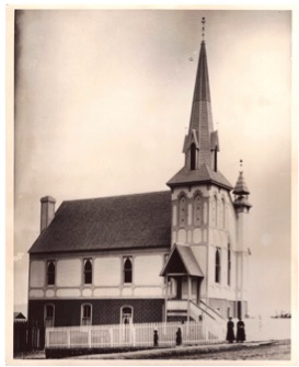 The Jacksonville Presbyterian Church photographed about 1885: a white timber church with a steep gable and a tall spire.